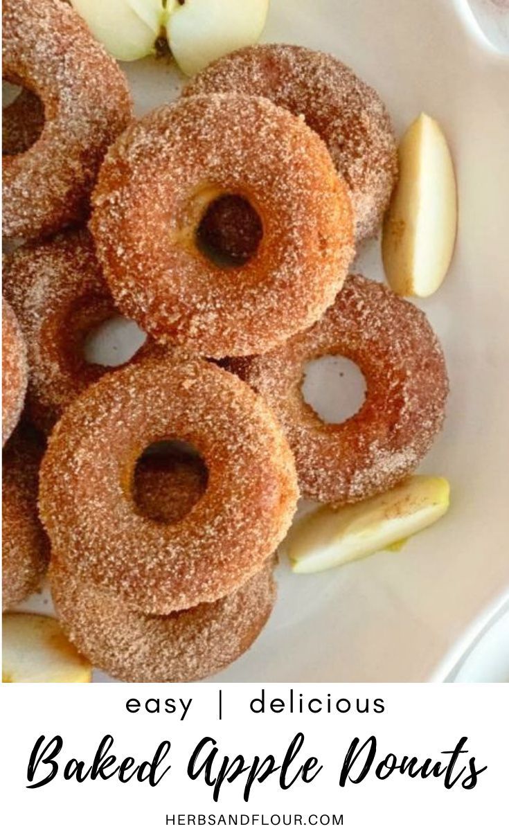 baked apple donuts on a white plate with apples in the background and text overlay that reads easy delicious baked apple donuts