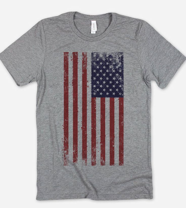 an american flag t - shirt with grungy paint on the front and back