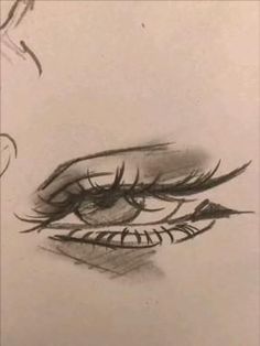 a drawing of a woman's eye with long lashes