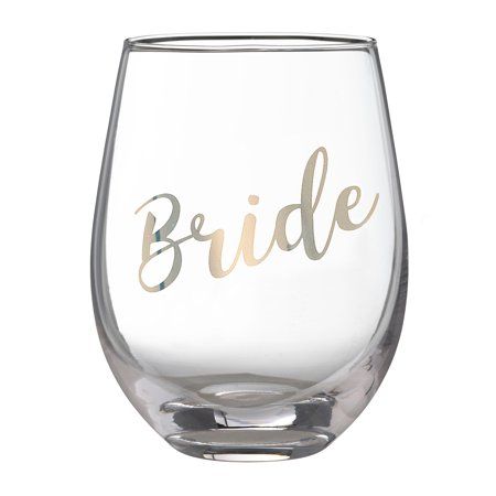 a wine glass with the word bride painted on it's side, in gold foil