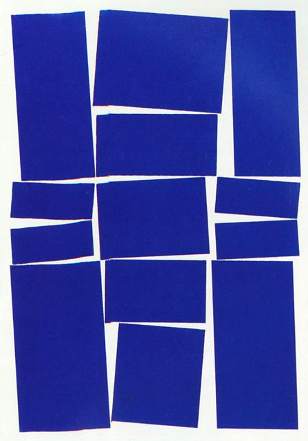 several pieces of blue paper are arranged on top of each other