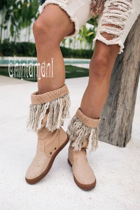 #shoes #women'sshoes #boots #veganboots #veganshoes #bohoboots #bohoshoes #bootswomen #fringeboots #shoeswomen #festivalboots #gypsyboots #cottoncanvasshoes #hippieshoes #barefootshoes #cowboyboots #chintamani #chintamanialchemistry Festival Boots With Tassels And Round Toe, Western Summer Boots With Fringe, Western Fringe Boots For Summer, Bohemian Closed Toe Boots For Spring, Spring Bohemian Ankle-high Boots, Bohemian Boots With Tassels And Round Toe, Bohemian Leather Boots With Fringe, Festival Leather Fringe Boots, Spring Bohemian Boots With Fringe