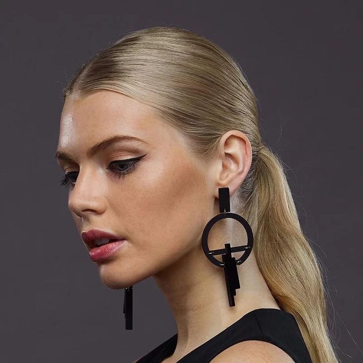 These Geometric Earrings are lightweight, acrylic geometric earrings perfect for casual and evening wear. Explore new levels of fashion when you add our Geometric Earrings to your accessory collection. These ultra-black, geometric, lightweight, acrylic, hanging earrings are the perfect way to express your inner statement. We loved the idea of the simplicity and clean design of the geometric shape. These earrings are great for days at work or nights in the town! Metal: Zinc Alloy Chic Geometric Earrings For Party, Trendy Black Geometric Earrings, Modern Black Earrings For Party, Modern Geometric Earrings For Party, Trendy Geometric Earrings For Party, Modern Geometric Party Earrings, Minimalist Geometric Earrings For Party, Modern Black Geometric Earrings, Trendy Black Geometric Jewelry