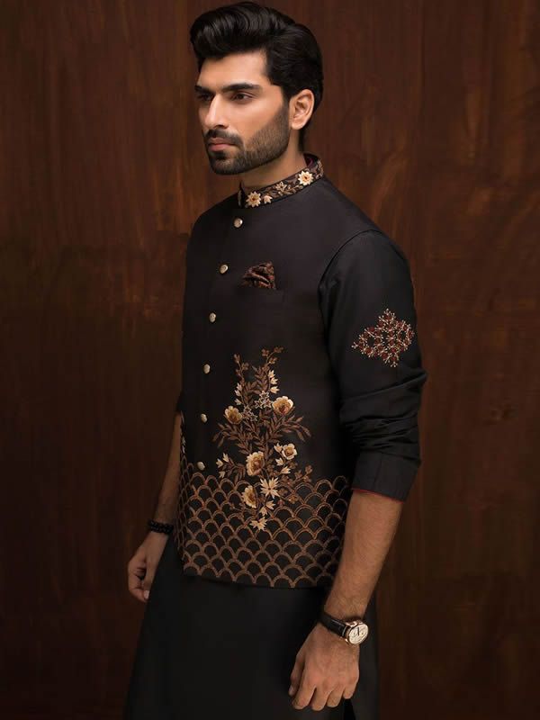 Waistcoat Color: BlackWaistcoat Fabric: Raw SilkSmart looking designer waistcoat features delicate embroidery accent the front and collarFancy button closureComplement with black embroidered kurta and shalwar  Additional Accessories:Peshawari Sandal / Khussa: US$50 Luxury Black Embroidered Nehru Jacket, Luxury Fitted Black Nehru Jacket, Luxury Brocade Bandhgala With Pallu, Groom Waistcoat, Embroidered Waistcoat, Wedding Waistcoats, Raw Silk, All About Fashion, Bespoke