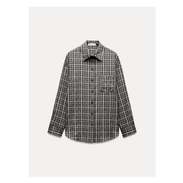 ZARA WOMAN COLLECTIONCotton blend shirt. Lapel collar and long cuffed sleeves. Chest patch pocket. Asymmetric round hem. Front button closure.