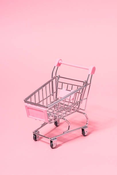 a shopping cart on a pink background stock photo getty images black bedroom furniture sets home design ideas