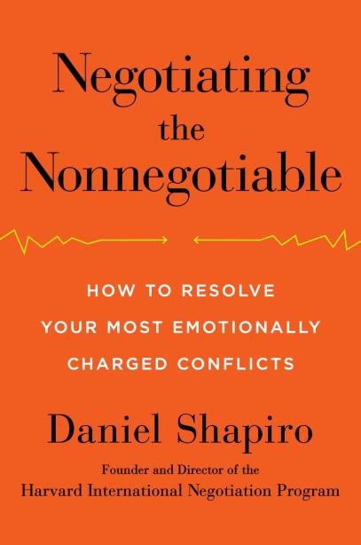 an orange book cover with the title negotiating the nonnegotiable