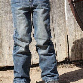 Medium Wash Denim Jeans For Ranch, Denim Jeans For Ranch Activities In Fall, Casual Medium Wash Jeans For Rodeo, Casual Medium Wash Jeans, Western Style Denim Bottoms For Fall, Casual Denim Blue Bottoms For Rodeo, Western Style Light Wash Denim Jeans, Casual Light Wash Bottoms For Rodeo, Rugged Faded Bottoms With Pockets