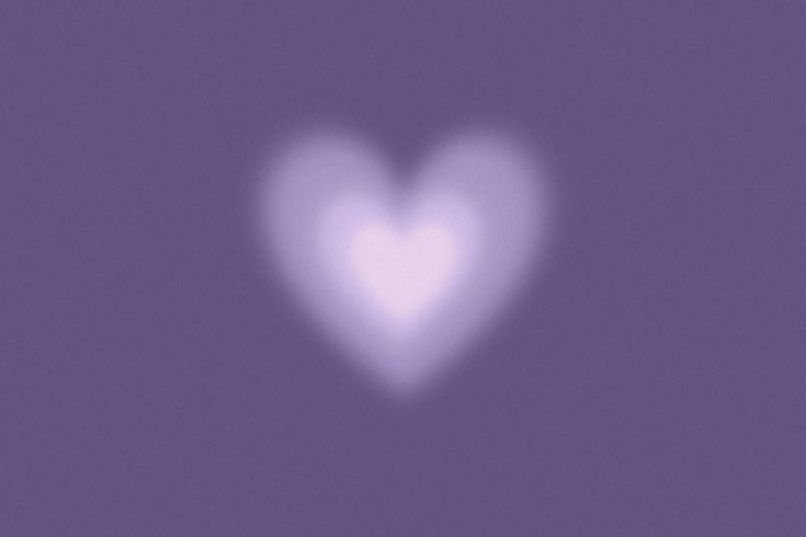 a white heart on a purple background