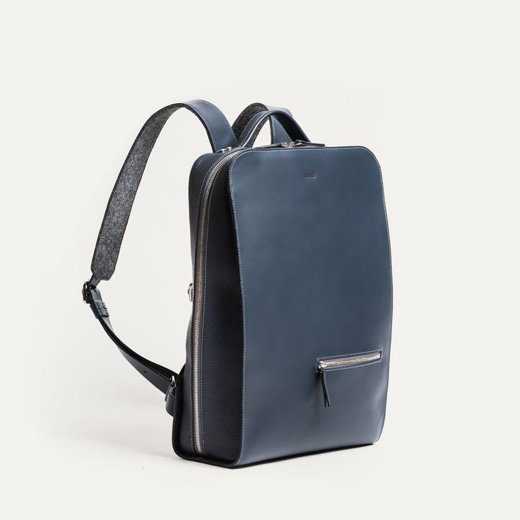 Our leather Matteo backpack offers timeless and minimalist lines. Each element has been meticulously designed to meet the needs of active professionals.
Ideal for your workdays, whether you're heading to the office, attending meetings, or on the go, this fully leather backpack is crafted to be your loyal companion. Its clever compartments allow you to easily slide in your laptop, tablet, and all essential accessories for your busy days.
The combination of smooth leather and grained leather gives Backpack For Laptop, Day Backpacks, Essential Accessories, Navy Leather, Slide In, Laptop Pocket, Laptop Backpack, Vegetable Tanned Leather, Leather Working