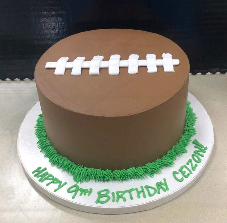 a birthday cake with a football on it