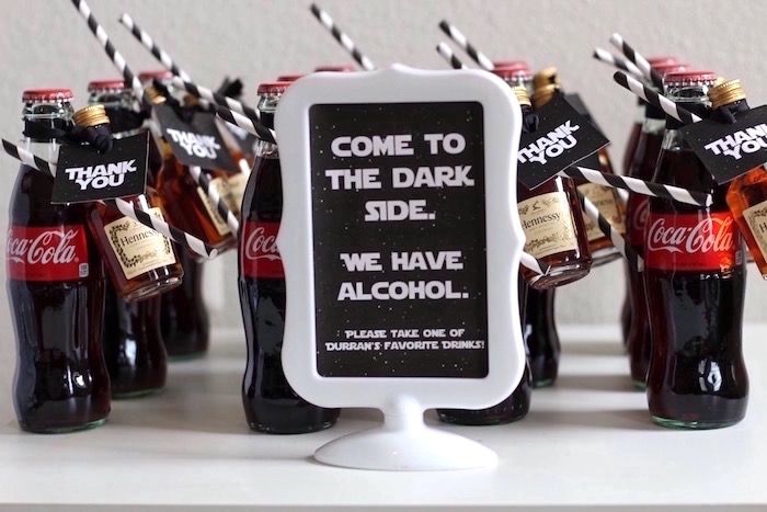 there is a sign that says come to the dark side we have alcohol