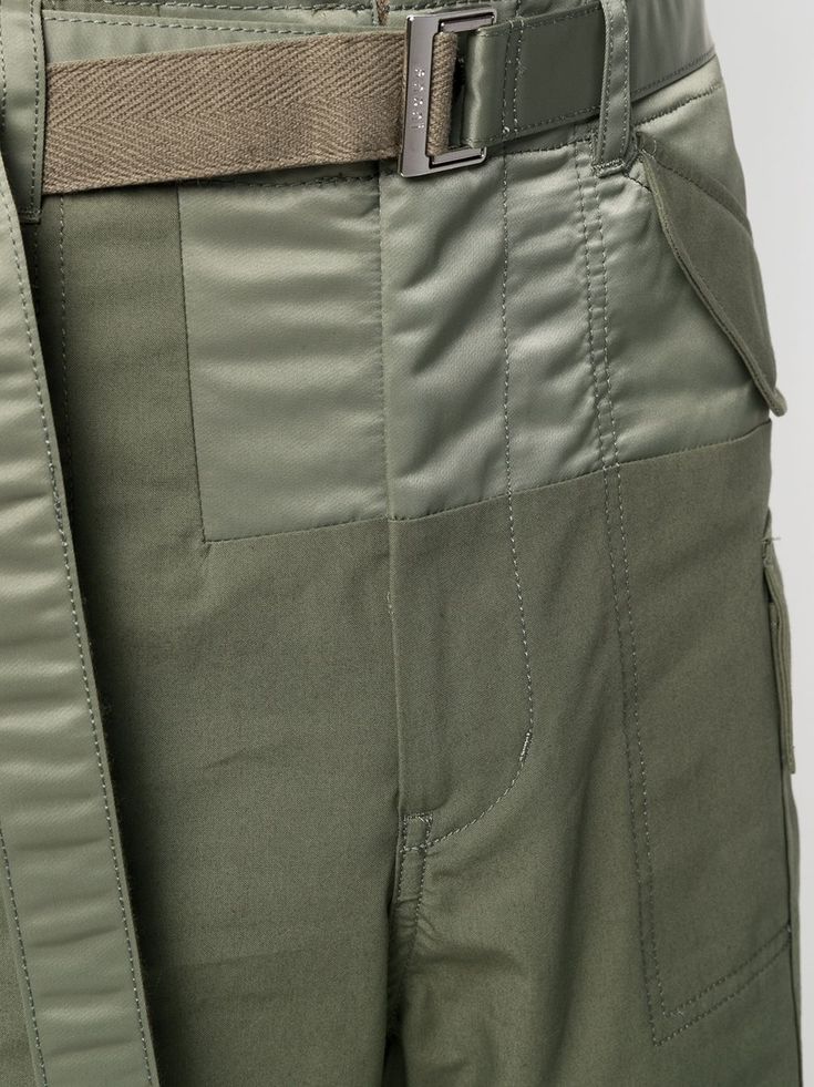 Khaki green cotton-blend knee-length utility shorts from SACAI featuring knee-length, strap detailing, silver-tone buckle fastening, belted waist, belt loops and tonal design. | Sacai Knee-Length Utility Shorts Cargo Shorts For Men, Utility Shorts, Cargo Shorts Men, Shorts For Men, Khaki Green, Green Cotton, Curator Style, Waist Belt, Sale Design