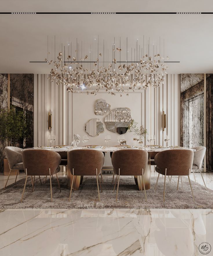 an elegant dining room with chandelier and marble table surrounded by beige velvet chairs