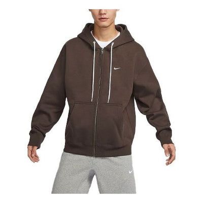 Nike Solo Swoosh Hoodie 'Brown' DR0404-237 Winter Sports Brown Sweatshirt, Brown Sporty Sweatshirt With Ribbed Cuffs, Sporty Brown Sweatshirt With Ribbed Cuffs, Brown Fleece Hooded Jacket With Double-lined Hood, Sporty Brown Hoodie For Streetwear, Brown Sporty Fleece Sweatshirt, Sporty Brown Fleece Sweatshirt, Brown Fleece Sporty Sweatshirt, Brown Hooded Jacket For Streetwear With Double-lined Hood