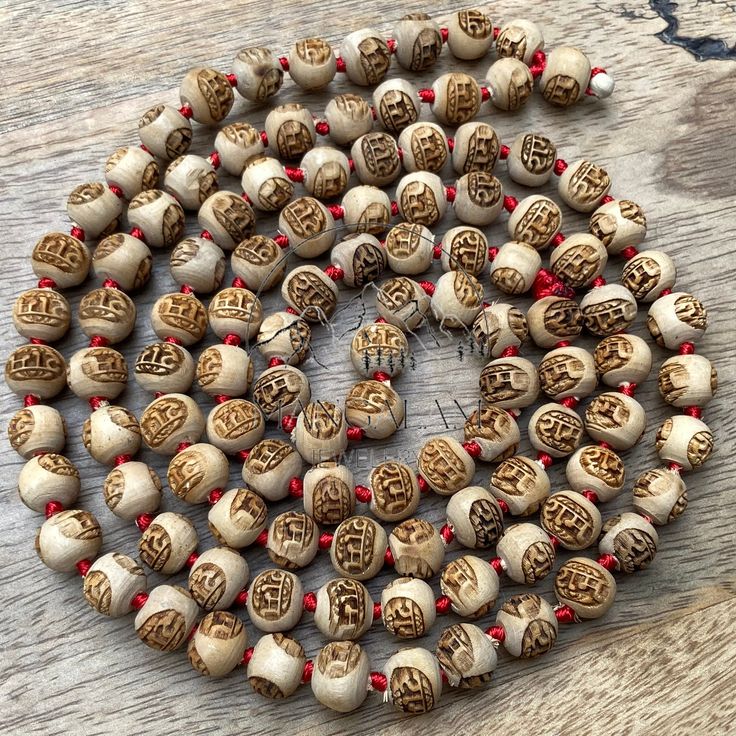 📿 This pure natural Tulsi Prayer Beads mala is made of 108 + 1 beads. Each bead is engraved with Lord Rama ' राम ' name in Hindi on it. Tulsi Mala maintains ritual purity and wards off evil. Tulsi Mala is also used for the purification of the body. Tulsi is considered to be an adaptogen, balancing different processes in the body, and helpful for adapting to stress.📿 🚪 Dimensions ( Approximately ) 🚪 📏Mala Beads size: 10 mm 📏No. of beads: 108+1 📏Mala Necklace Length: 46-47 inches 🤚 HANDCRA Traditional Natural Beads As A Gift, Traditional Natural Beads For Gifts, Traditional Natural Beaded Necklaces As Gift, Traditional Natural Beaded Necklaces For Gifts, Traditional Beaded Necklaces As Gift, Traditional Natural Beaded Necklace Gift, Holistic Necklaces With 8mm Beads For Festivals, White Gemstone Beads For Festivals, Traditional White Necklace For Healing