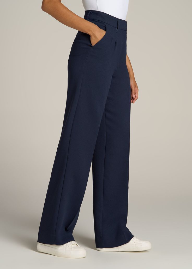 About Our Extra-Long Women’s Dress Pants Make a statement in these stylish pleated women’s tall dress pants. Pleated trousers are a timeless trend you’ll love and now, there’s finally a pair that will accentuate your long legs. These pants for tall women have been designed specifically for ladies between 5’9” and 6’6”, with a full length offering extra-long inseam options. They have a high-rise silhouette that gives the appearance of a cinched waist, complete with a fly zipper and hook and bar c Formal Solid Color Wide-leg Pantsuit, Formal Wide-leg Pantsuit In A Solid Color, Tailored Full Length Solid Wide Leg Pants, Tailored Full Length Wide Leg Pants, Tailored Solid Color Wide Leg Full Length Pants, Pleated Wide Leg Ankle-length Pants For Business Casual, Pleated Ankle-length Wide Leg Pants For Business Casual, Elegant High-waisted Wide Leg Pants For Spring, Elegant Wide-leg Pants For Business Casual