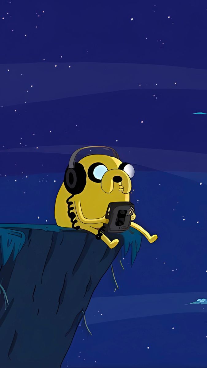 a cartoon character sitting on top of a cliff with headphones in his ears and holding a cell phone up to his ear