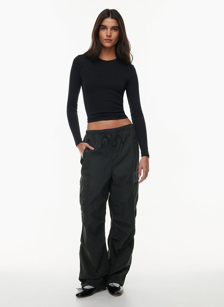 Nylon Wide Leg Cargo Parachute Pants, Urban Cargo Style Parachute Pants For Fall, Nylon Wide Leg Parachute Pants With Cargo Pockets, Wide Leg Nylon Parachute Pants With Cargo Pockets, Fall Nylon Bottoms With Cargo Pockets, Sporty Parachute Pants With Cargo Pockets For Fall, Sporty Cargo Parachute Pants For Fall, Sporty Cargo Style Parachute Pants For Fall, Sporty Fall Cargo Parachute Pants