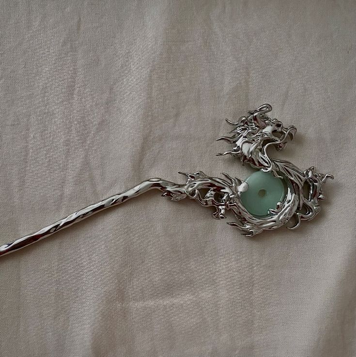 Chinese jade dragon fantasy silver hair stick, modernised ancient Chinese aesthetic, metallic aesthetic, cdrama jewelry, Asian hairstyles,  new Chinese style, China street fashion, hair inspo, douyin, daenerys targaryen aesthetic Dragon Accessories Aesthetic, Dragon Aesthetic Chinese, Jade Dragon Aesthetic, Chinese Jade Aesthetic, Asian Magic Aesthetic, Chinese Jewellery Traditional, Traditional Asian Aesthetic, Chinese Jewelry Aesthetic, Ancient Chinese Accessories