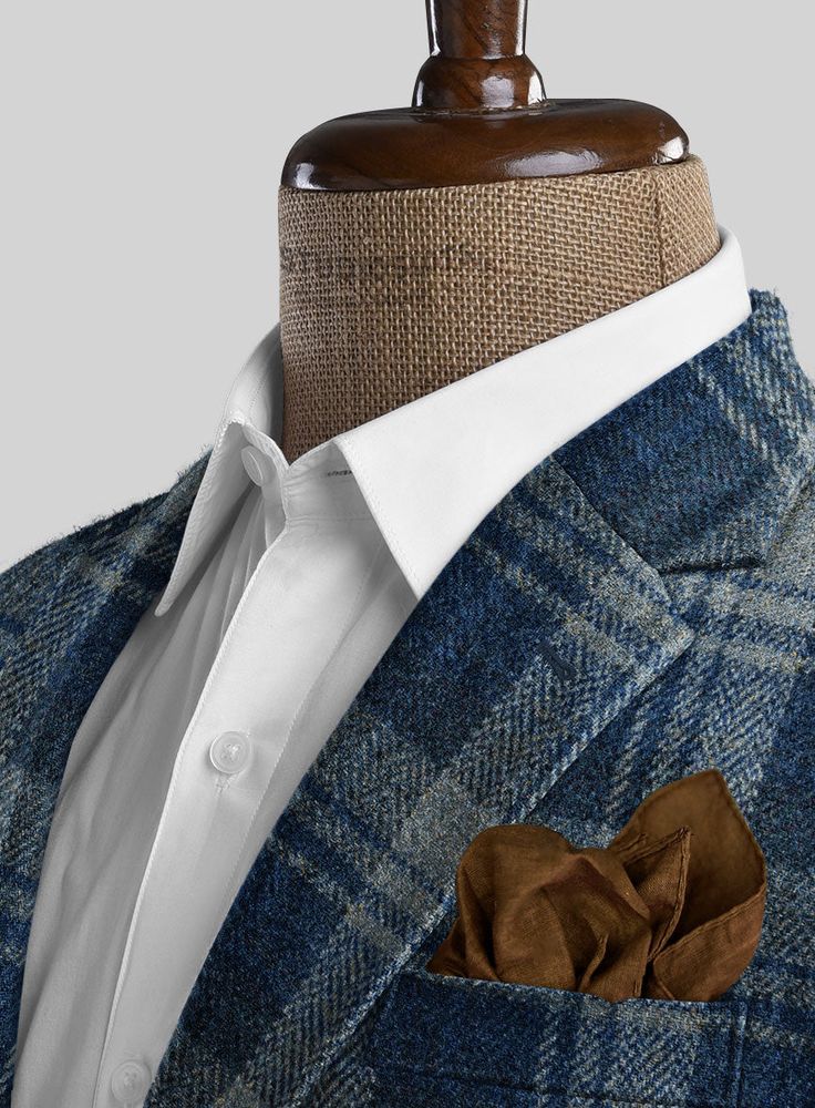 Make brilliant modernity in your fashion with additional flawlessness in your tweed collection. Tailored with pure wool fabric, our Harris Tweed Blue Tartan Jacket is woven in a checks pattern with various shades of fresh and crisp blue color that shows clear signs of prosperity in your look. In addition, this custom-made piece is a great partner for your winter celebrations or casual work wear, which will spruce up your appearance. So wear our fabulous piece that presents itself with a bounty o Tartan Suit, Casual Work Wear, Grey Tweed, Blue Tartan, Tartan Fabric, Harris Tweed, Stylish Mens Outfits, Black Button, Jacket Buttons