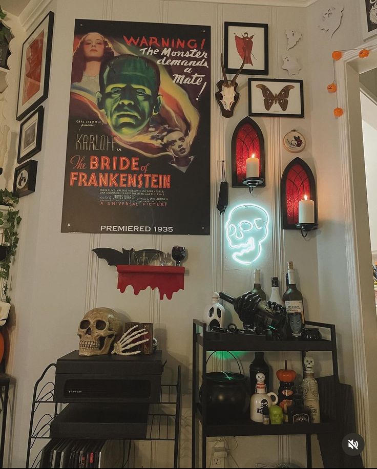 a room filled with halloween decorations and posters on the wall