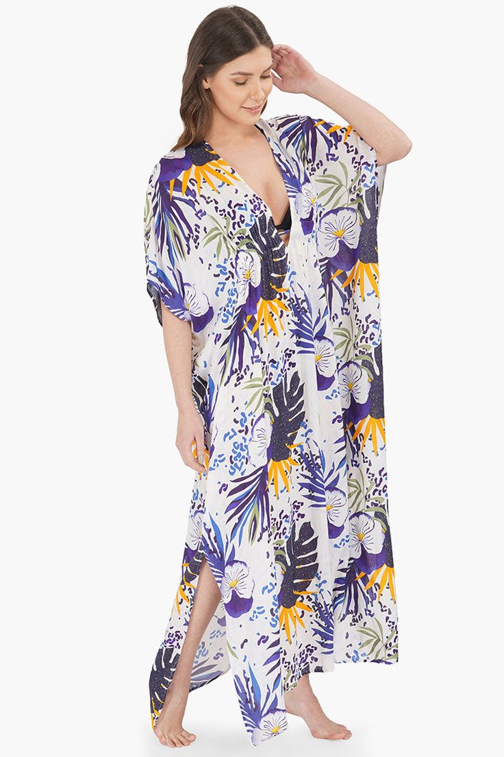 Kaftan Dress V-neckline Drawstring tie at waist Blue tropical print all over Loose and comfortable fit Made in soft viscose fabric Let the sun shine, let the flowers bloom, let the rainbow gleam through! None of it can hold a candle to our beautiful tropical twilight cover up.Is it time for the vacay you have been waiting for since ages. Bro Tip? Pack this sexy, comfy and sassy kaftan and you're set to take the flight off!Pair this piece with an adorable pair of slip-on sandals and the chicest s Twilight Cover, Leopard Bag, Vacation Looks, Sun Shine, Flowers Bloom, Kaftan Dress, Viscose Fabric, Bag Dress, Tropical Print