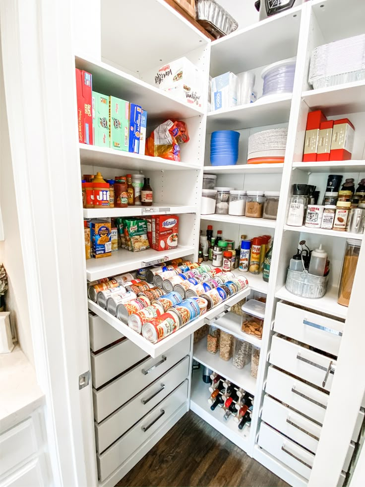 an organized pantry with lots of food in it