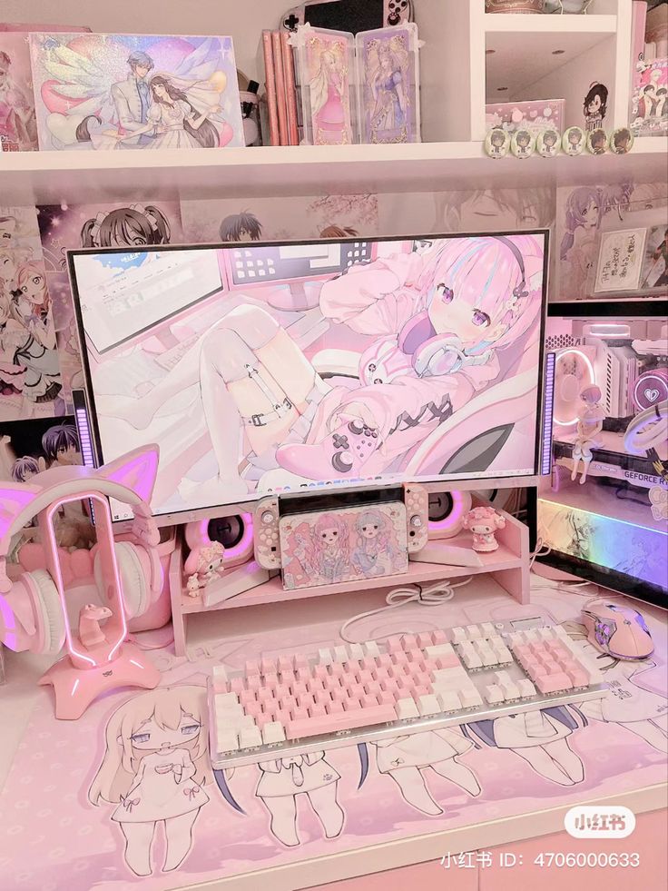 a desktop computer sitting on top of a desk next to a keyboard and headphones