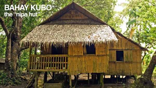 an image of a hut in the woods that looks like it is made out of bamboo