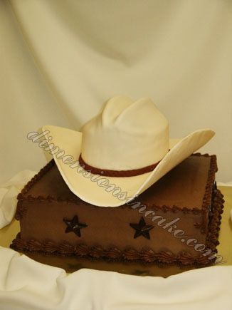 a cake with a cowboy hat on top