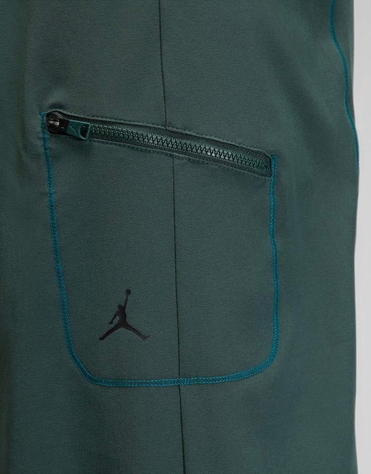 Sweatpants by Jordan For the rotation Drawstring waistband Zip pockets Elastic cuffs Regular fit Green Drawstring Bottoms For Streetwear, Green Sportswear Pants With Pockets, Green Sweatpants With Drawstring, Green Athleisure Cargo Pants For Sports, Green Drawstring Sweatpants, Green Lounge Pants With Side Pockets, Green Loungewear Pants With Side Pockets, Sporty Green Sweatpants With Cargo Pockets, Green Cargo Pocket Pants For Loungewear