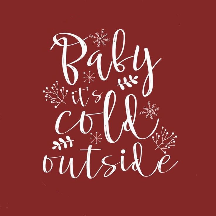 the words baby it's cold outside written in white ink on a red background