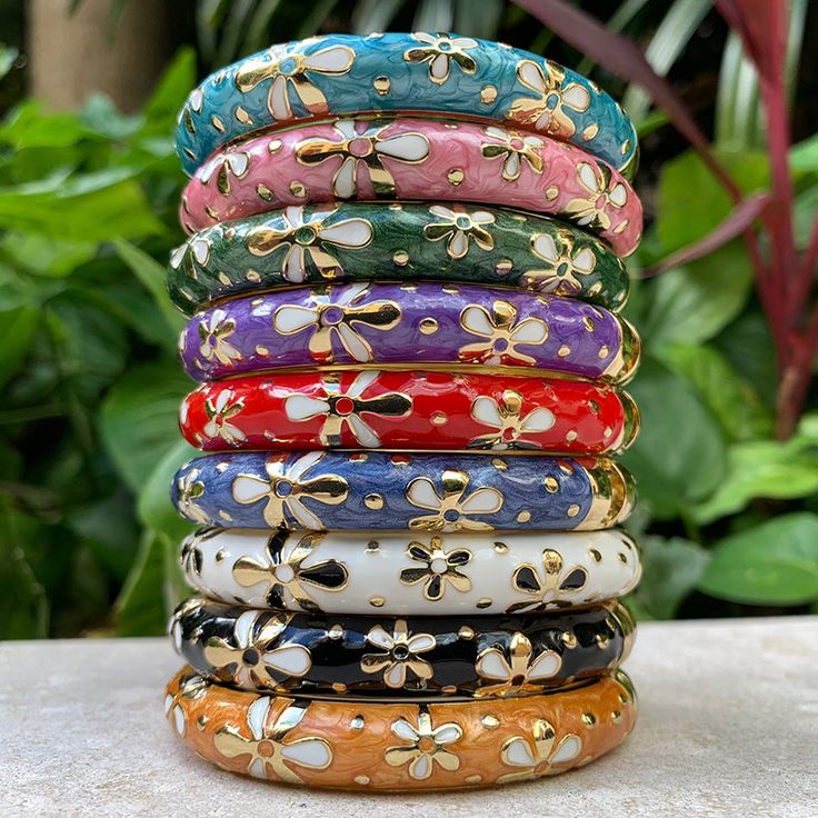 Choose from a set of three colors that we matched just for you. Black/White/Gold, Purple/Red/Blue or Pink/Teal/Green. Nothing showcases our islands beautiful colors more than these tropical colors. Bright and vibrant and unique to the islands these stylish bangles go with anything! The bangles have a hinged opening so they are easy to slip on and off. Wear them separately or all together. Keep them for yourself or give them to friends! Individually wrapped in a matching organza bag! If you pick Stylish Bangles, Tiare Flower, Colorful Bangles, The Bangles, Blue Or Pink, Blouse Neck, Bangles Jewelry Designs, Tropical Colors, Red And Teal