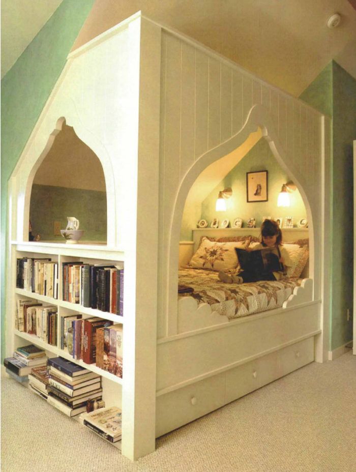 a child's room with a bed and bookshelf in the corner,