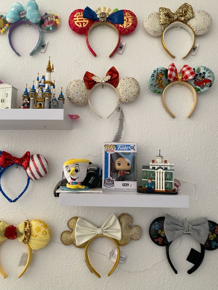 there are many disney mouse ears on the wall