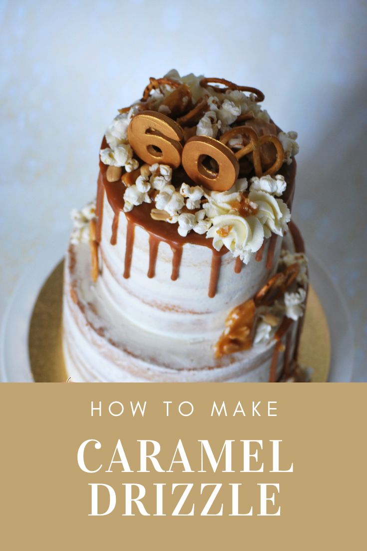 a three tiered cake covered in caramel and popcorn with the number 80 on top