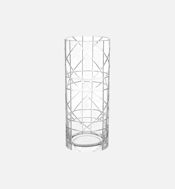 a clear glass vase sitting on top of a table