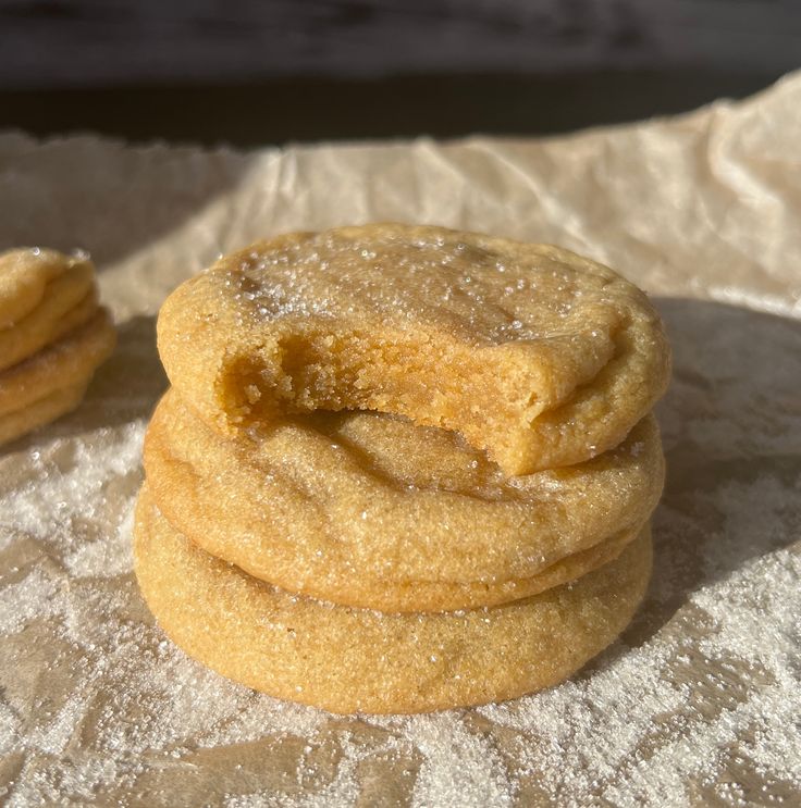 three sugar cookies stacked on top of each other