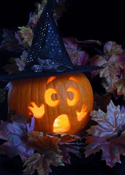 a pumpkin with a face carved into it