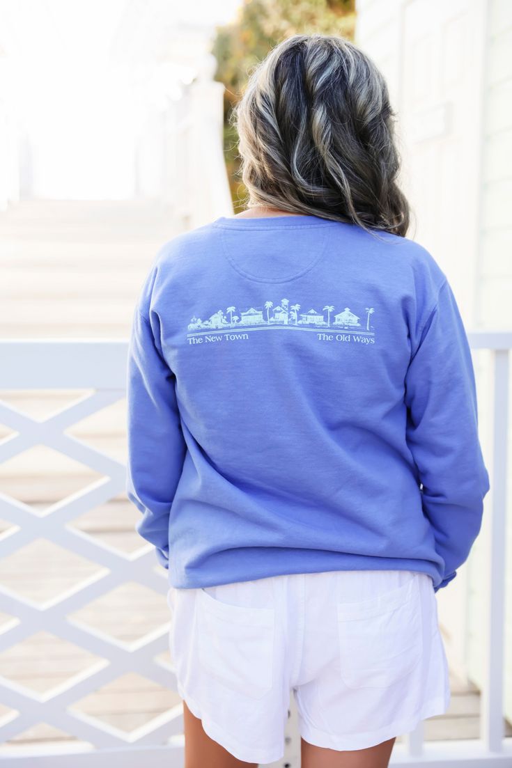 Unisex Florida Blue Seaside Crew Sweatshirt Made in America Fabric: 80/20 Cotton Polyester Features: Garment Dyed Sweatshirt SEASIDE® logo screen printed across the chest "New Town, Old Ways" on the back