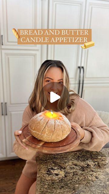 a woman holding a loaf of bread in front of her face with the words bread and butter candle appetizer