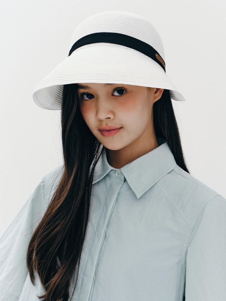 marieclaire, which began in France in 1954, is a brand that has accompanied women around the world in beauty, fashion, and lifestyle. It offers the relaxed mood of everyday life, imbued with a rich French sensibility. - Sun visor hat style- Wide flared brim silhouette- Contrasting tape band with logo patch embellished- Made of durable and lightweight rattan fabric- Self-tie strap at the back Curved Brim Boater Hat For Travel, Chic Boater Hat For Travel, Uv Protection Brimmed Panama Hat, Chic Visor Sun Hat For Travel, Classic Hats With Uv Protection For Spring, White Panama Hat With Short Brim For Spring, Chic Travel Visor Hat, Classic White Curved Brim Sun Hat, Classic Spring Sun Hat For Everyday