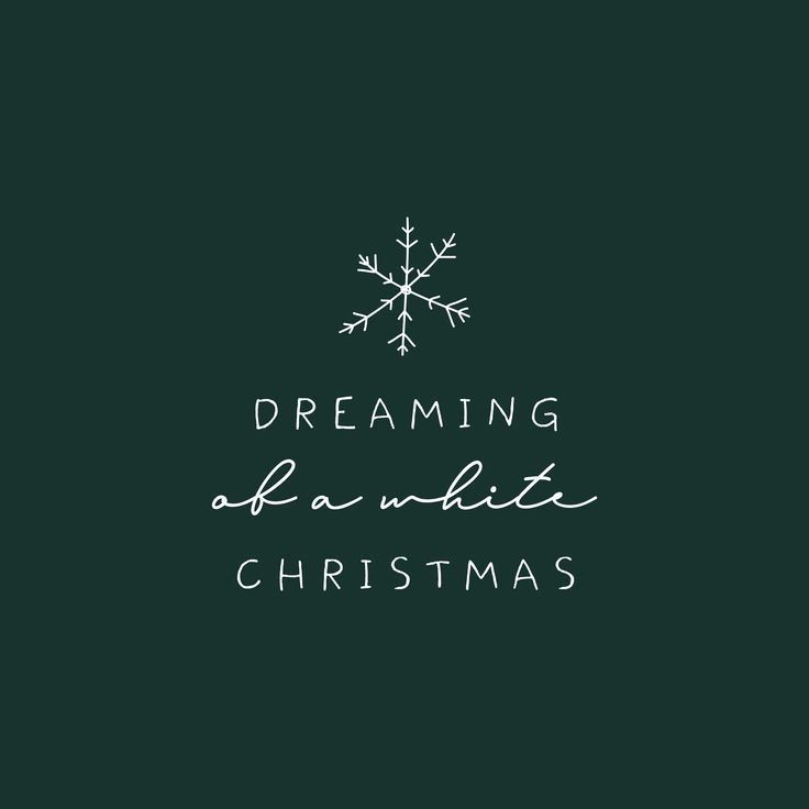 the words dreaming of a white christmas on a green background