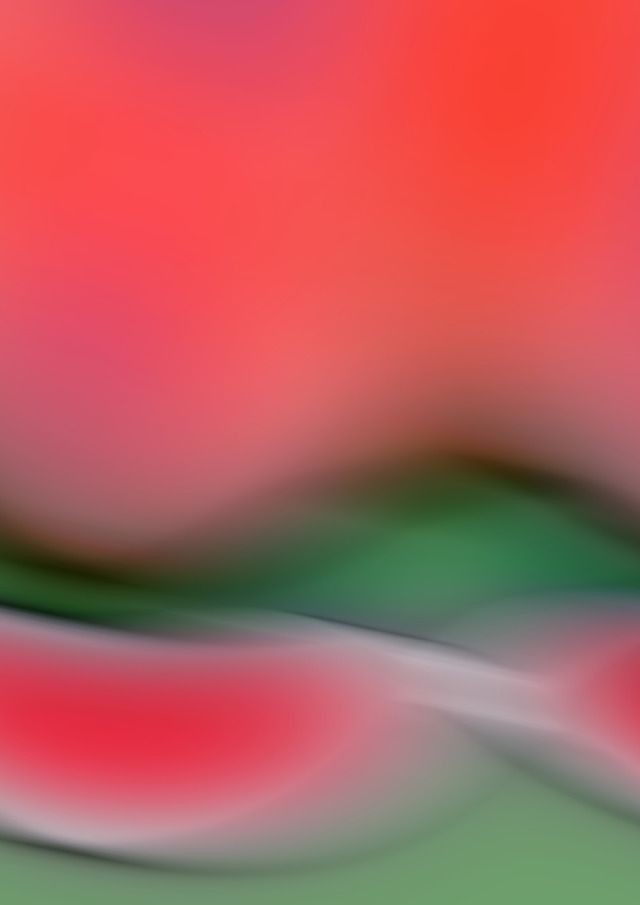 blurry image of red and green shapes