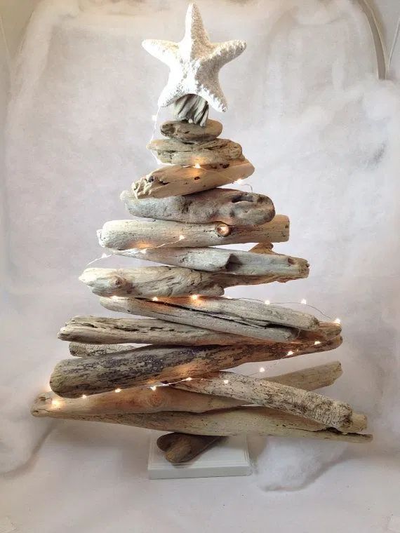 a christmas tree made out of driftwood is displayed on the instagram page for an article