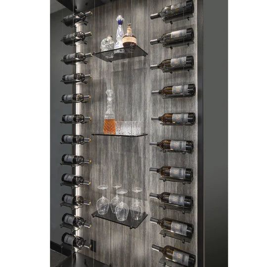 a wine rack filled with bottles and glasses on top of a wooden shelf next to a wall