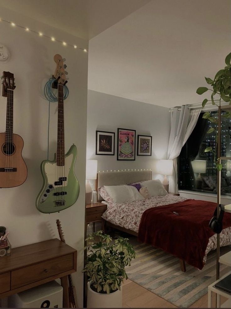 a bedroom with guitars hanging on the wall