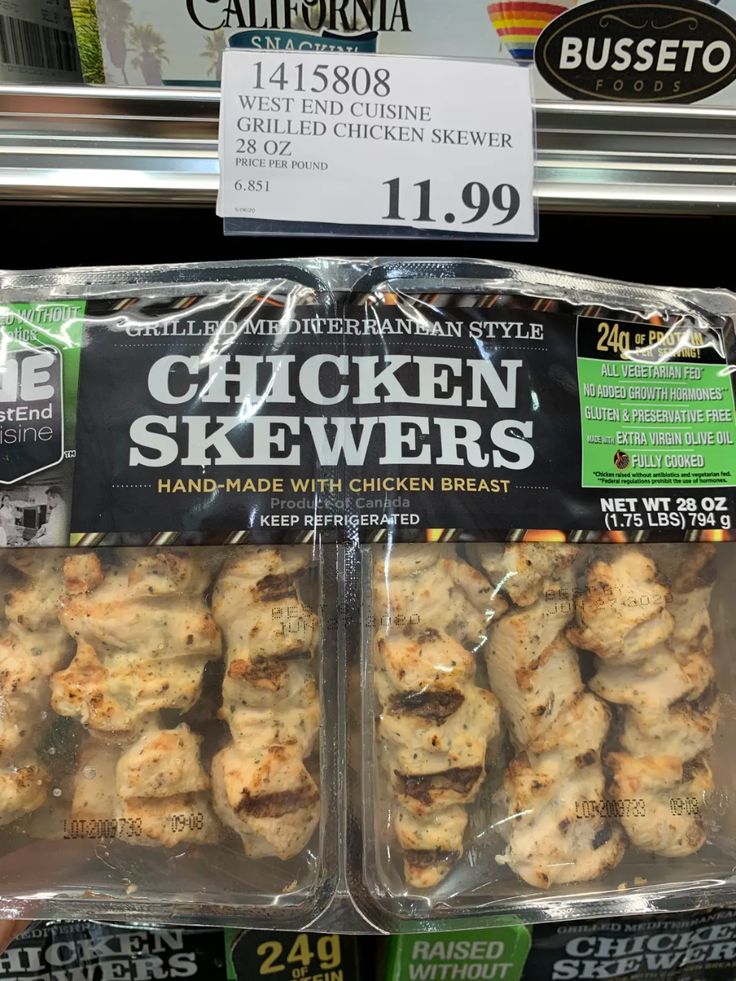 chicken skewers are on display for sale in the store aisle at costco