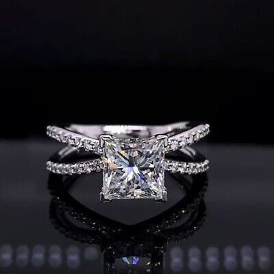 a princess cut diamond engagement ring with pave diamonds